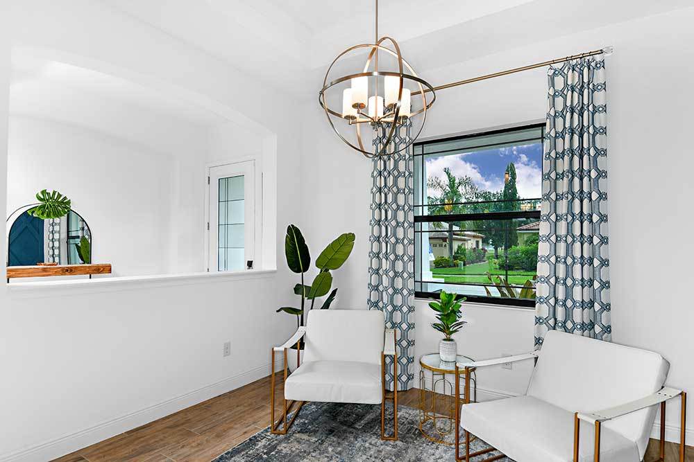 Joyce model home formal living room and foyer by William Ryan Homes Tampa