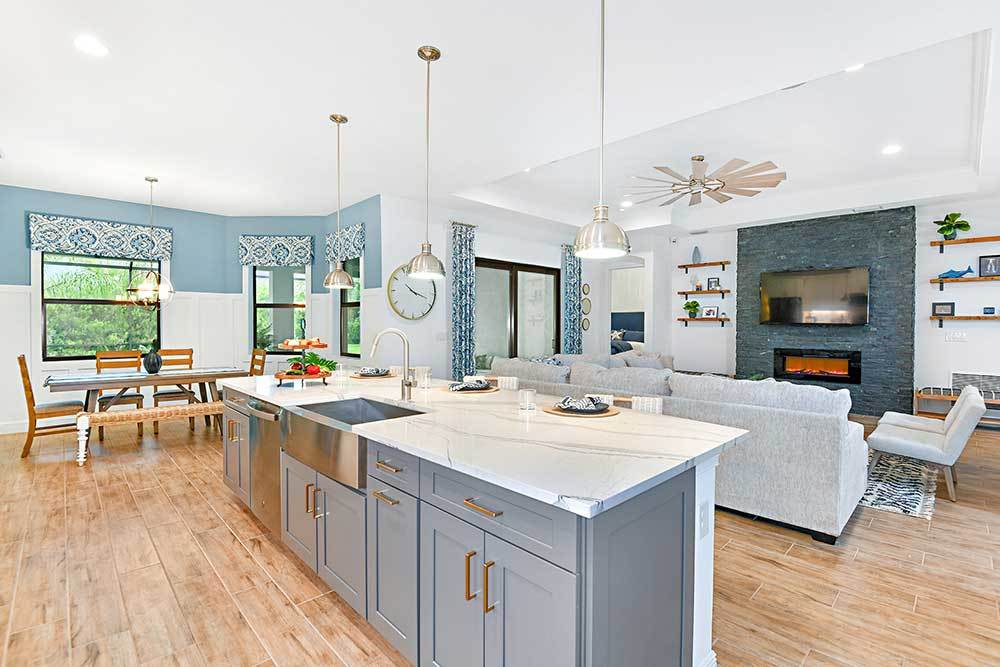 Joyce model home open concept kitchen opens onto the great room and breakfast area by William Ryan Homes Tampa