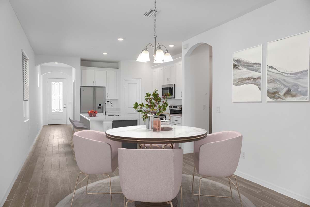 Flora model new home for sale by William Ryan Homes Ft Myers Entry and kitchen