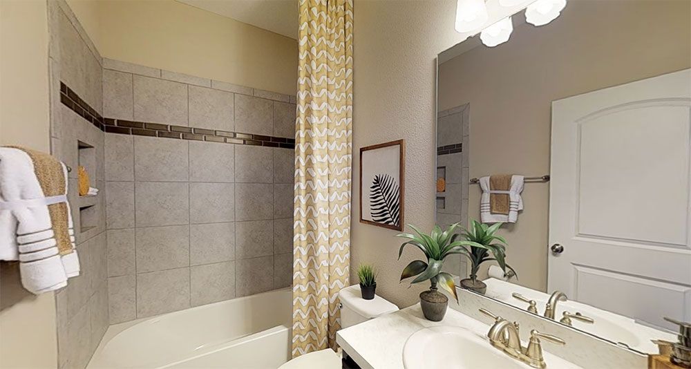 Sweetwater 3-Car New Home Hall Bath
