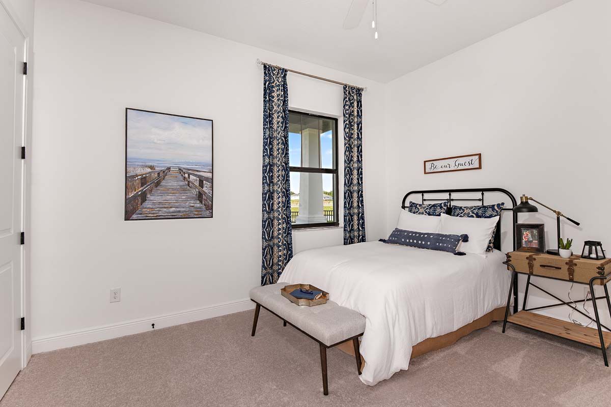 Sweet Bay model home bedroom 3 angled view William Ryan Homes Tampa