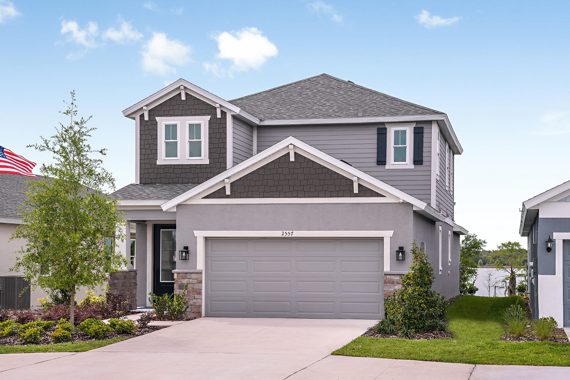 Jade model home exterior craftsman with opt stone William Ryan Homes 