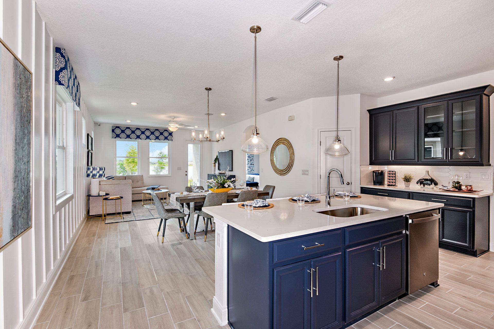 Jade model new home for sale at The Sanctuary at Babcock Ranch by William Ryan Homes Ft Myers- Kitchen and Family Room 