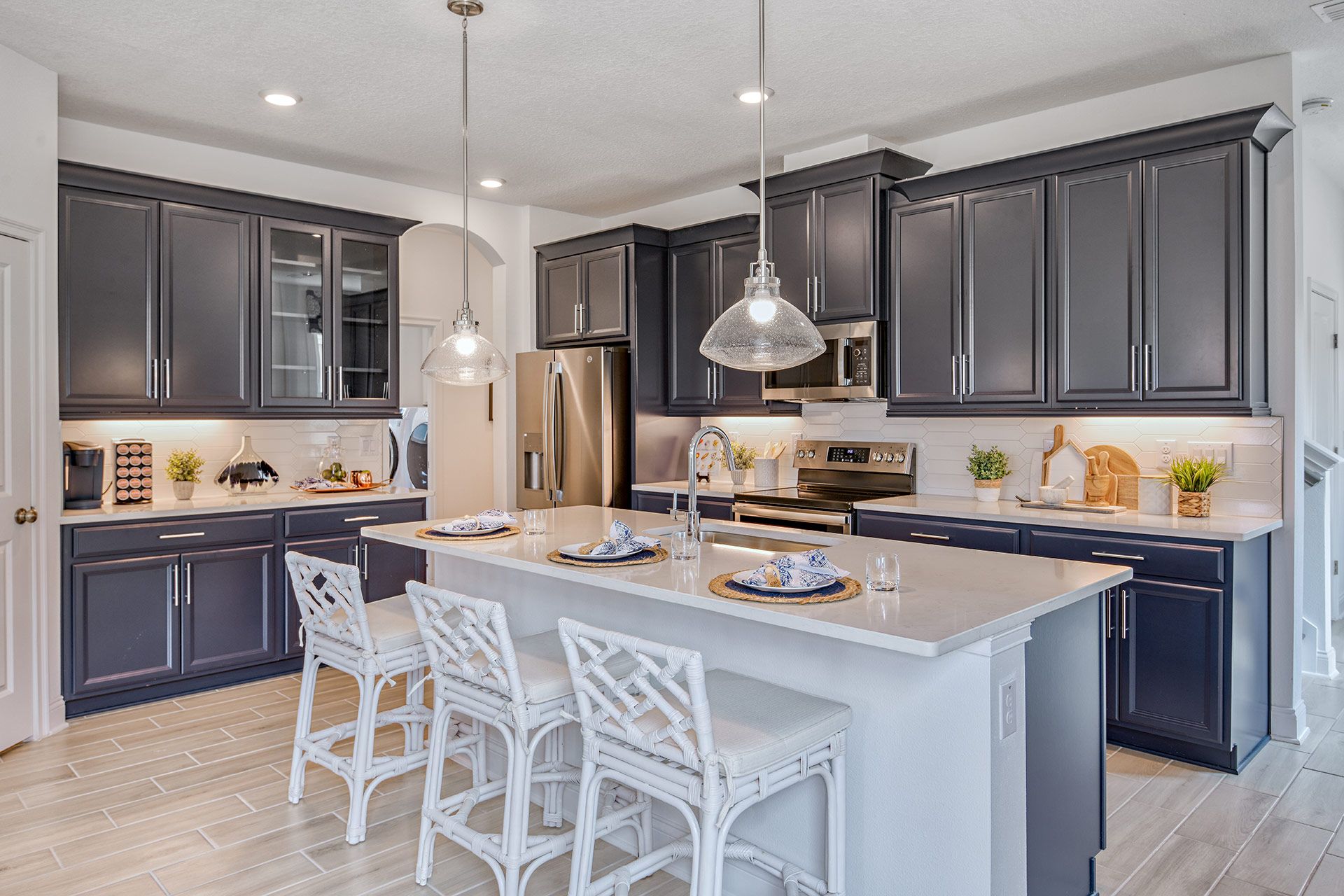 Jade model new home for sale at The Sanctuary at Babcock Ranch by William Ryan Homes Ft. Myers - Kitchen Island 