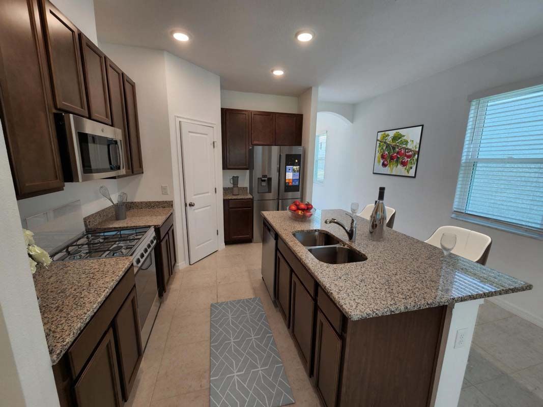 Cypress model new home for sale by William Ryan Homes Ft Myers open kitchen 