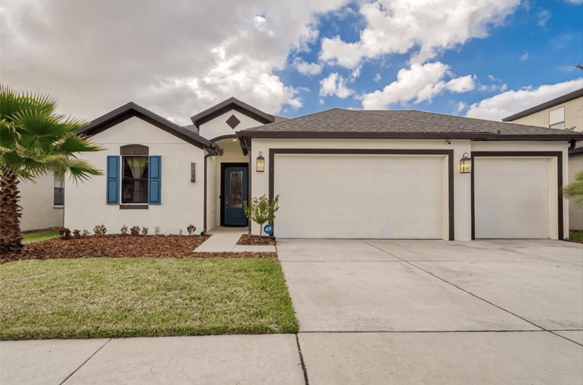 Sweetwater 3-car French country elevation new home plan by William Ryan Homes Tampa
