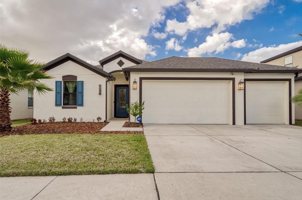 Sweetwater 3-car French country elevation new home plan by William Ryan Homes Tampa