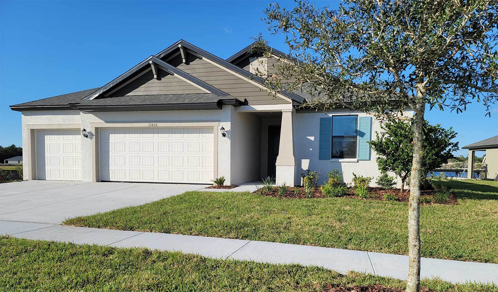  Sweetwater 3-car coastal elevation new home plan by William Ryan Homes Tampa