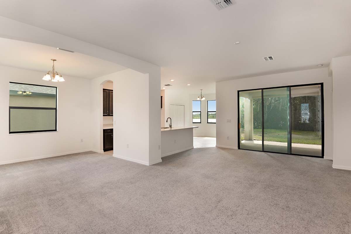 Juno home plan great room view to kitchen and dining William Ryan Homes Tampa