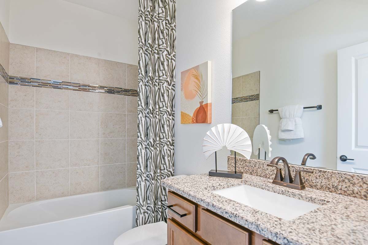 Sandalwood new home plan second floor bathroom 3 at Tea Olive Terrace by William Ryan Homes Tampa