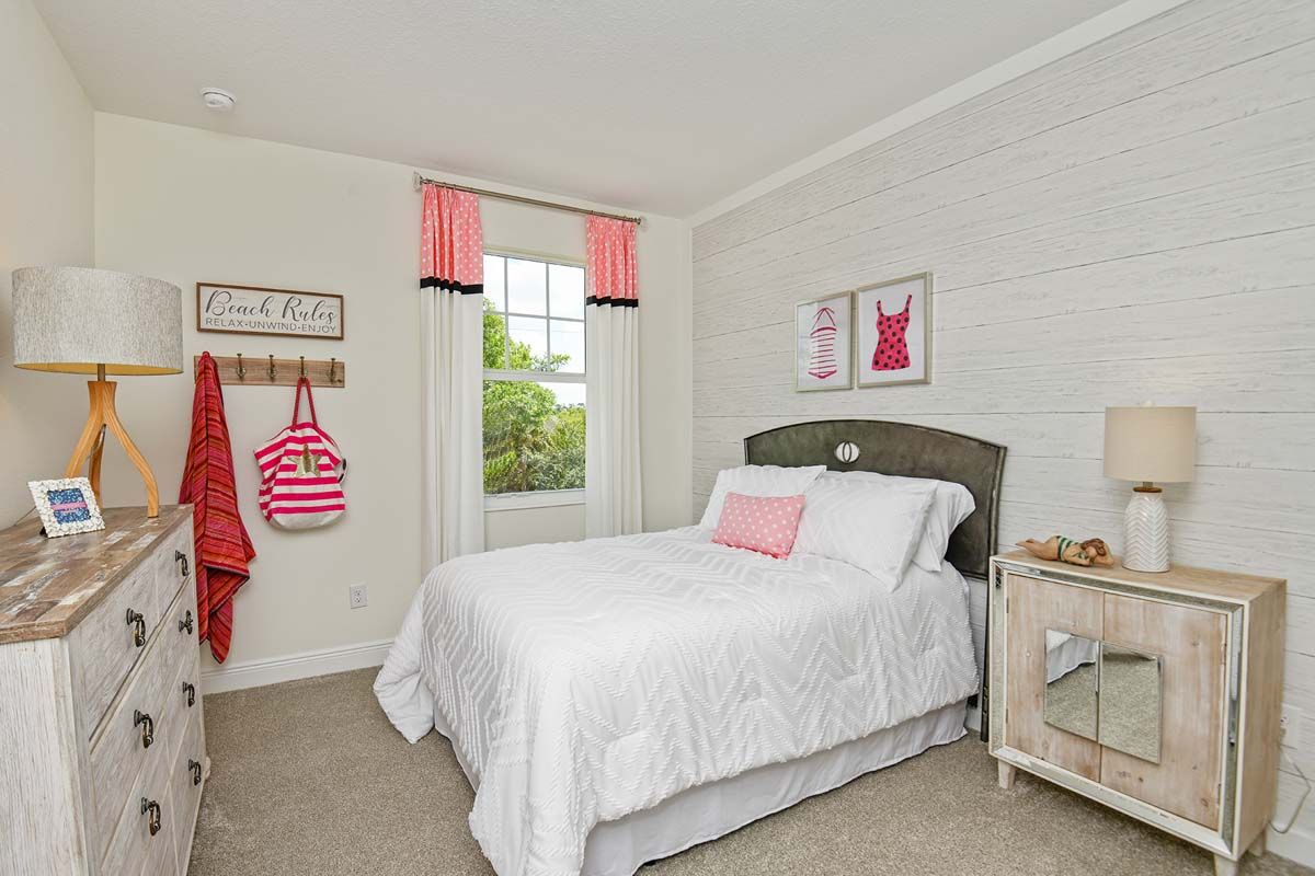 Sandalwood new home plan second floor bedroom 2 at Tea Olive Terrace by William Ryan Homes Tampa