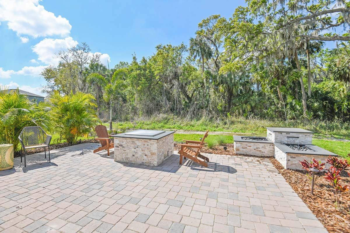 Sandalwood new home plan outdoor water and fire feature at Tea Olive Terrace by William Ryan Homes Tampa