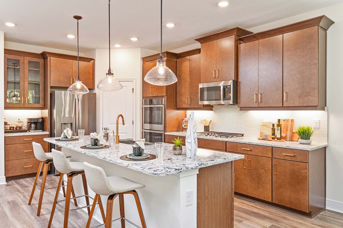 Sandalwood new home kitchen area at Tea Olive Terrace by William Ryan Homes Tampa