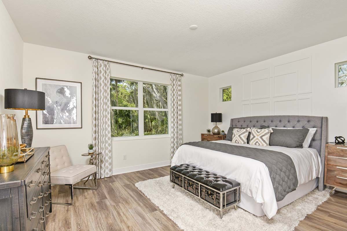 Sandalwood new home first floor owners suite at Tea Olive Terrace by William Ryan Homes Tampa