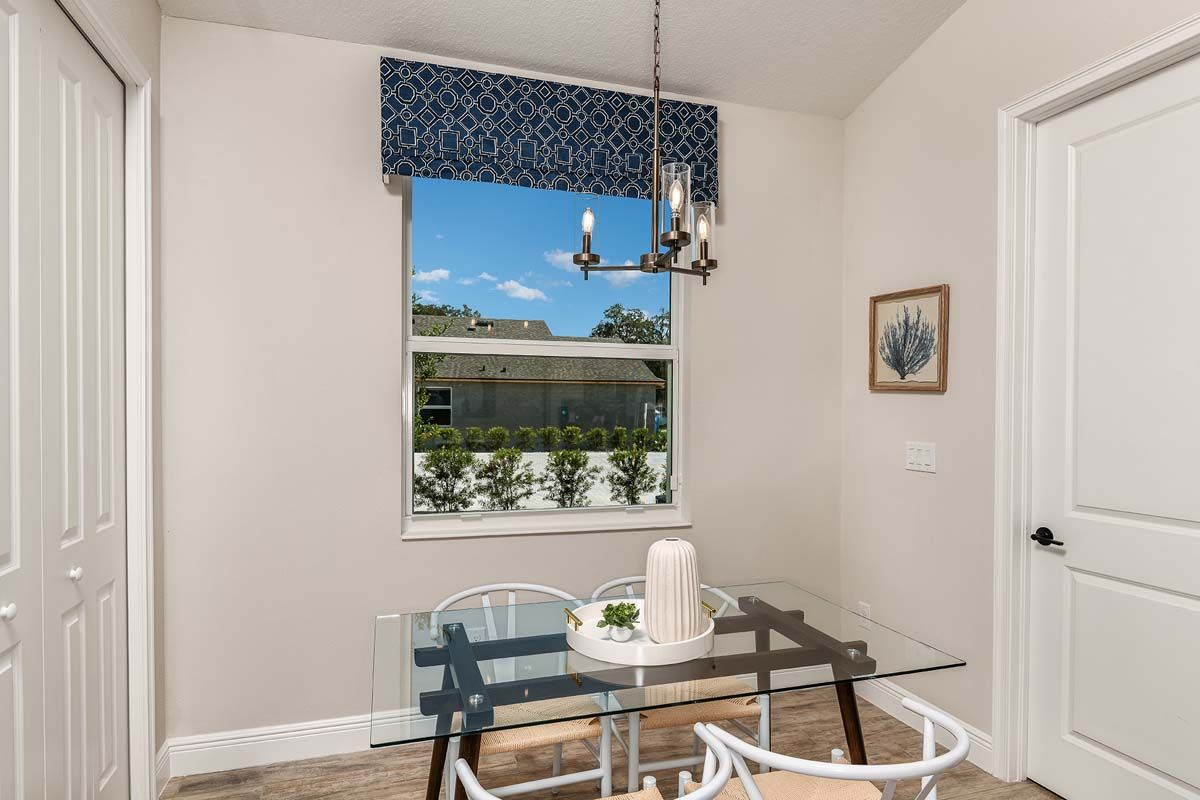 Sweetwater new construction home plan dining cafe by William Ryan Homes Tampa