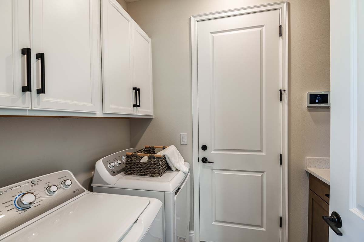 Sweetwater new construction home plan laundry room by William Ryan Homes Tampa