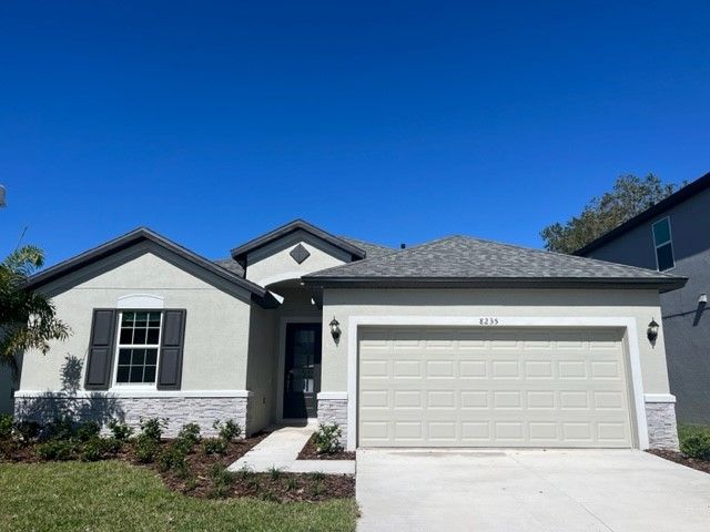 Sweetwater french country with opt stone by William Ryan Homes Tampa