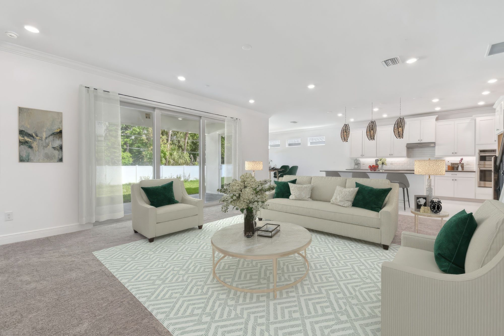Jupiter new construction home plan open-concept living great room view to kitchen by William Ryan Homes Tampa