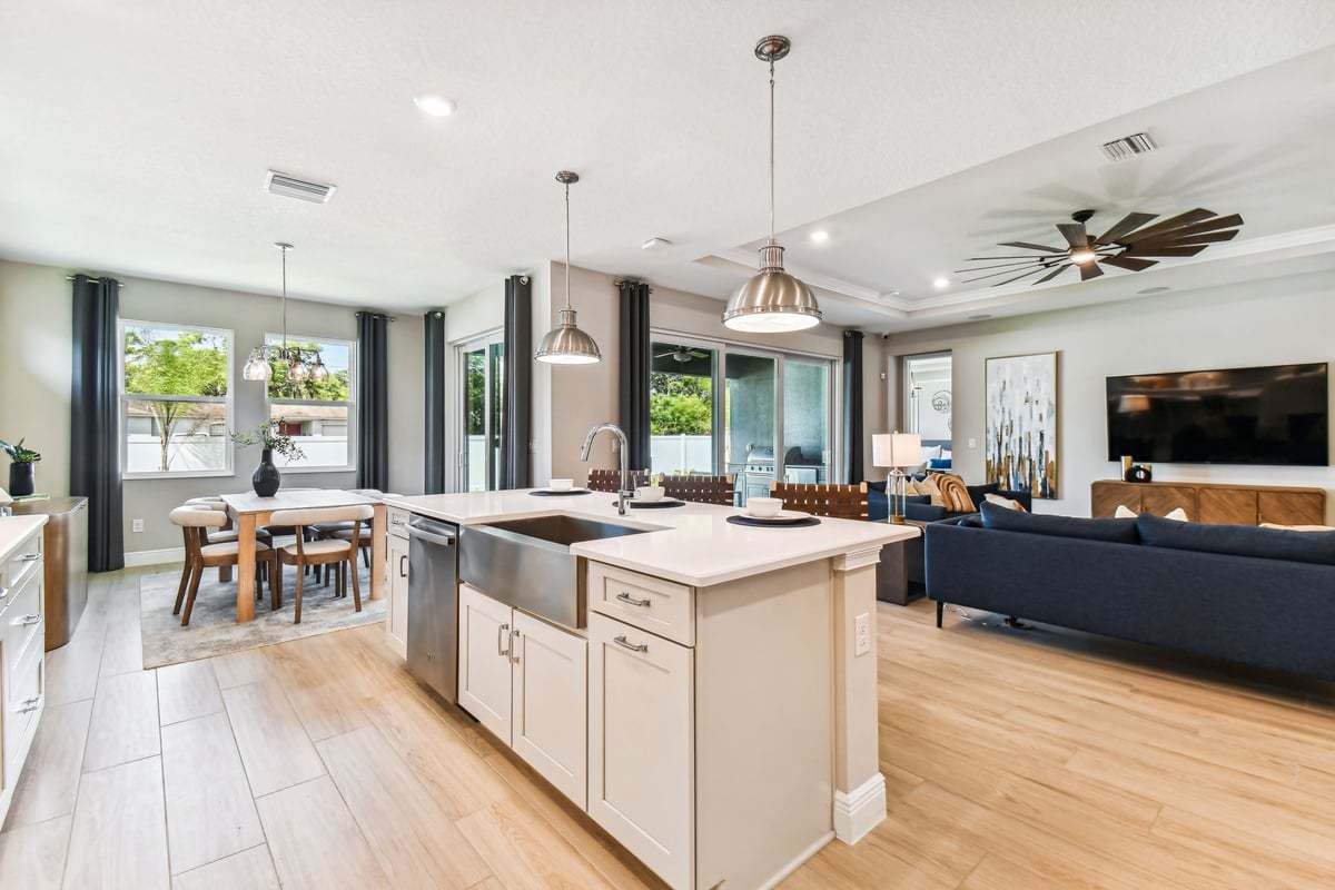 Charlotte new construction home plan open-concept living great room from kitchen view by William Ryan Homes Tampa