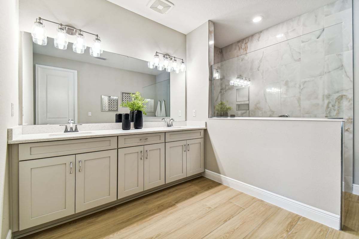Charlotte new construction home plan owner's retreat bathroom roman shower by William Ryan Homes Tampa