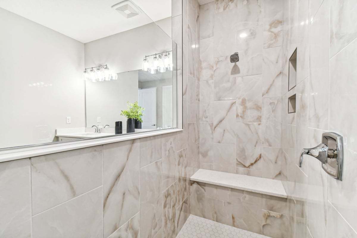 Charlotte new construction home plan owner's bathroom roman shower by William Ryan Homes Tampa