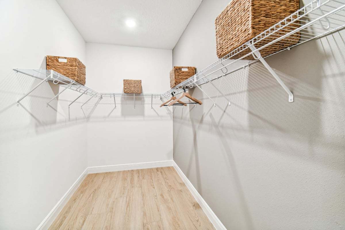 Charlotte new construction home plan owner's walk-in closet ample storage by William Ryan Homes Tampa