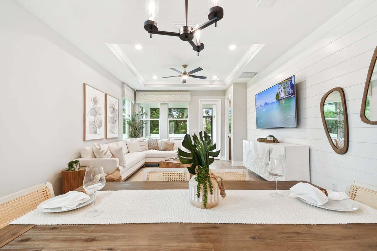 Sandpiper new construction luxury paired villa home plan cafe view to family room in 55+ in Sun City Center, FL at Fairway Pointe by William Ryan Homes Tampa