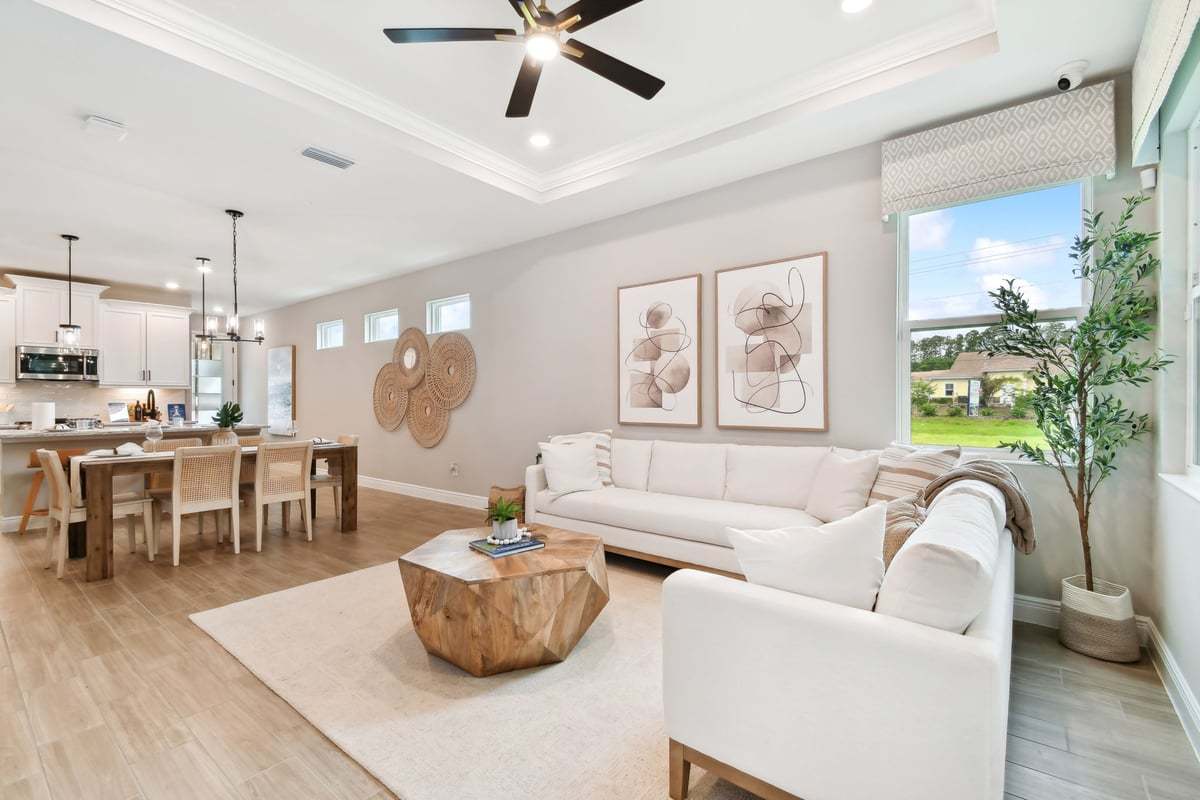 Sandpiper new construction luxury paired villa home plan spacious family room in 55+ in Sun City Center, FL at Fairway Pointe by William Ryan Homes Tampa