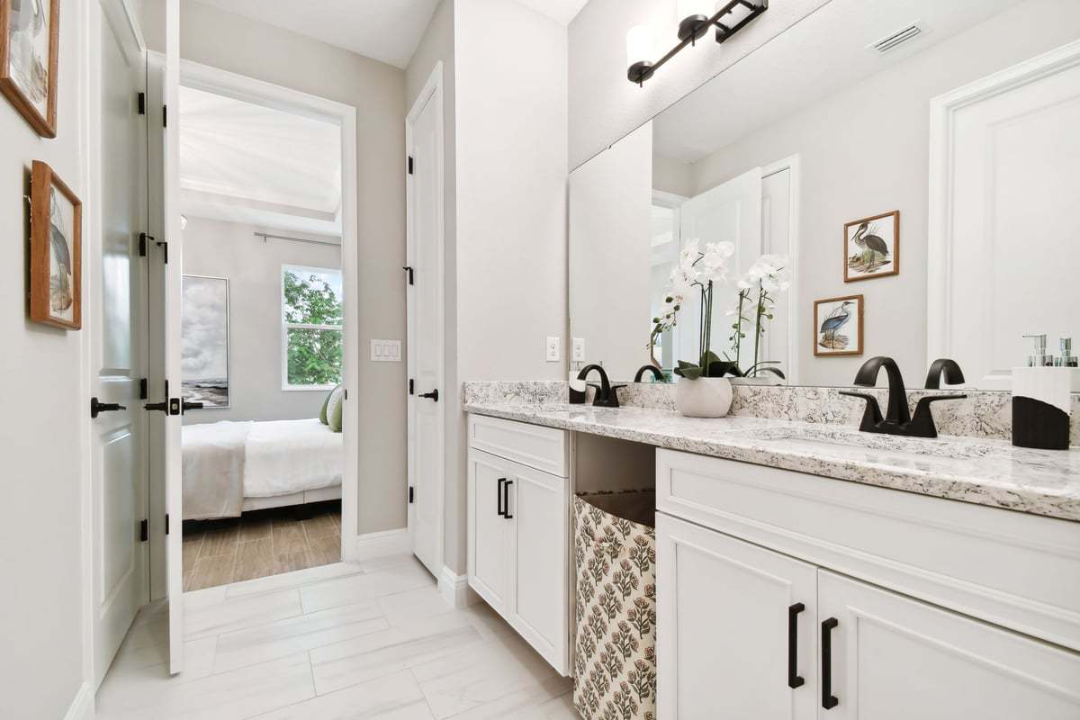 Sandpiper new construction luxury paired villa home plan spacious owner's bathroom in 55+ in Sun City Center, FL at Fairway Pointe by William Ryan Homes Tampa