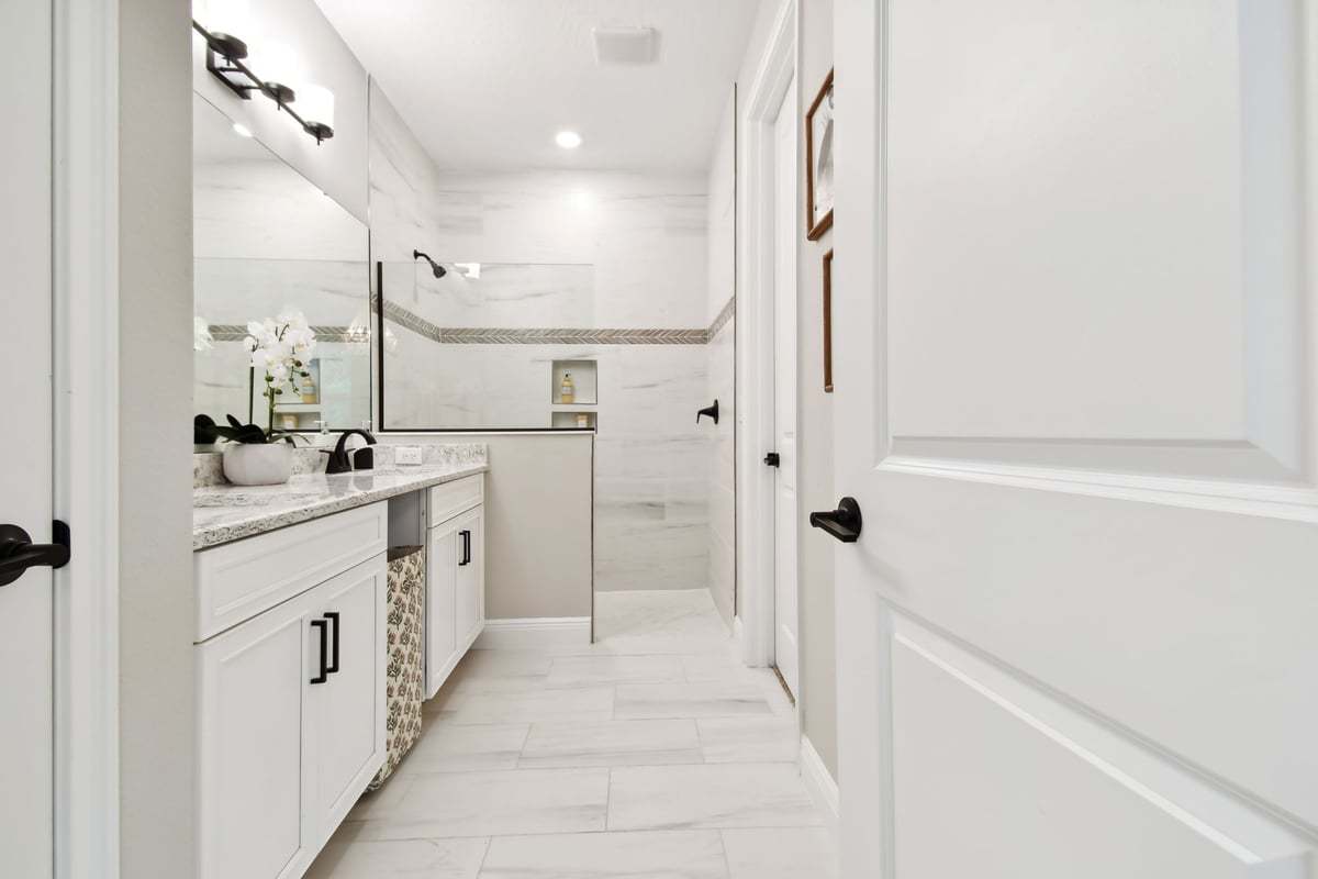 Sandpiper new construction luxury paired villa home plan owner's bath in 55+ in Sun City Center, FL at Fairway Pointe by William Ryan Homes Tampa