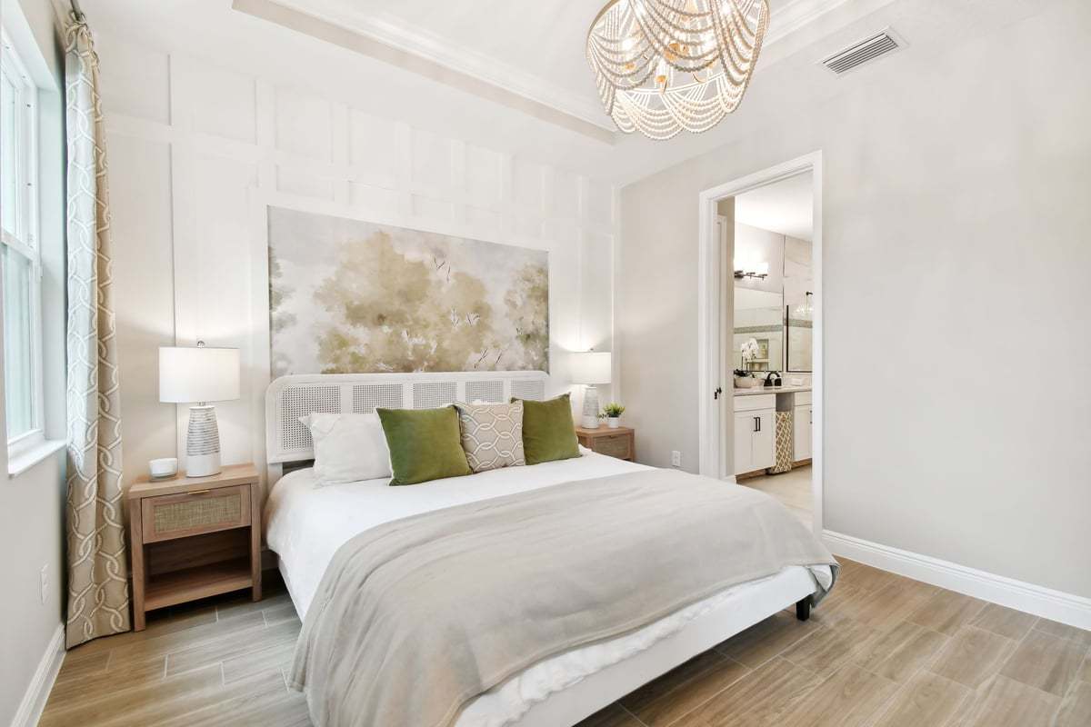 Sandpiper new construction luxury paired villa home plan owner's suite in 55+ in Sun City Center, FL at Fairway Pointe by William Ryan Homes Tampa