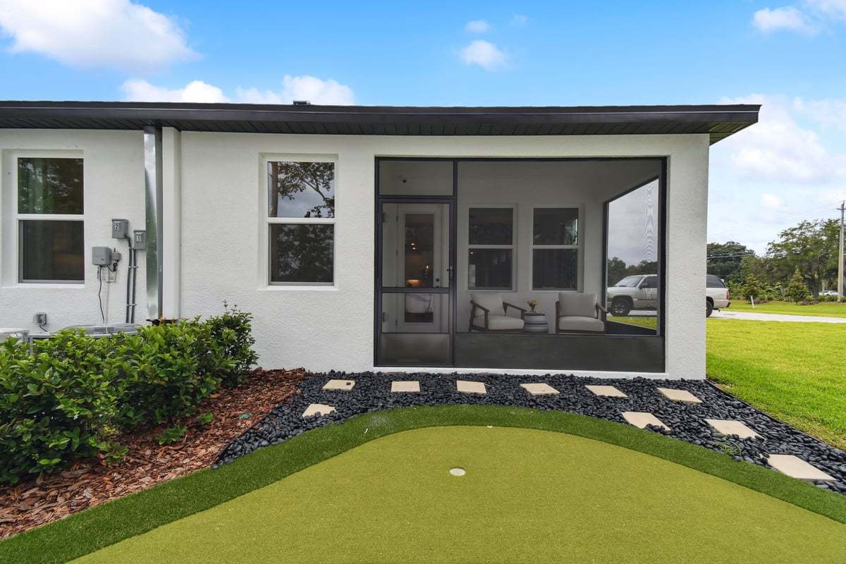 Sandpiper new construction luxury paired villa home plan rear screened lanai in 55+ in Sun City Center, FL at Fairway Pointe by William Ryan Homes Tampa