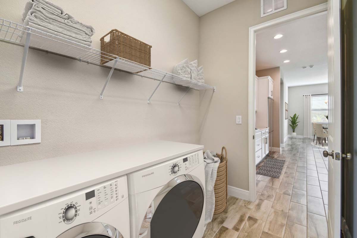 Strabane new construction home plan interior laundry room by William Ryan Homes Tampa