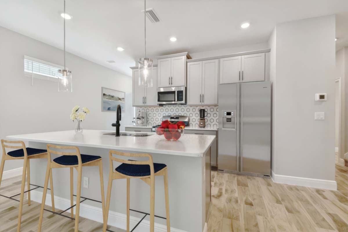 Jewel luxury new construction paired villa in Sun City Center, FL spacious kitchen island by William Ryan Homes Tampa