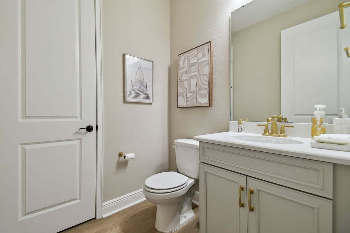 Sebastian new construction home plan first floor powder room  by William Ryan Homes Tampa