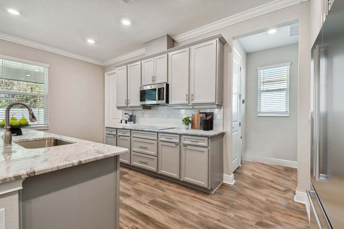 Sawgrass new construction home plan spacious kitchen living by William Ryan Homes