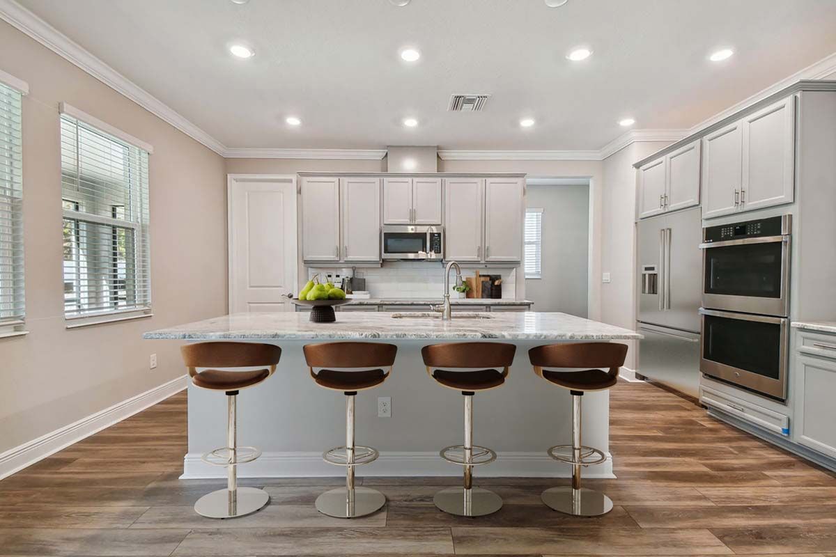 Sawgrass new construction home plan spacious kitchen living by William Ryan Homes