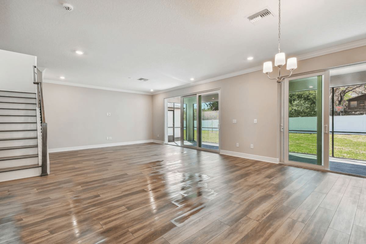 Sawgrass new construction home plan great room view to covered lanai by William Ryan Homes