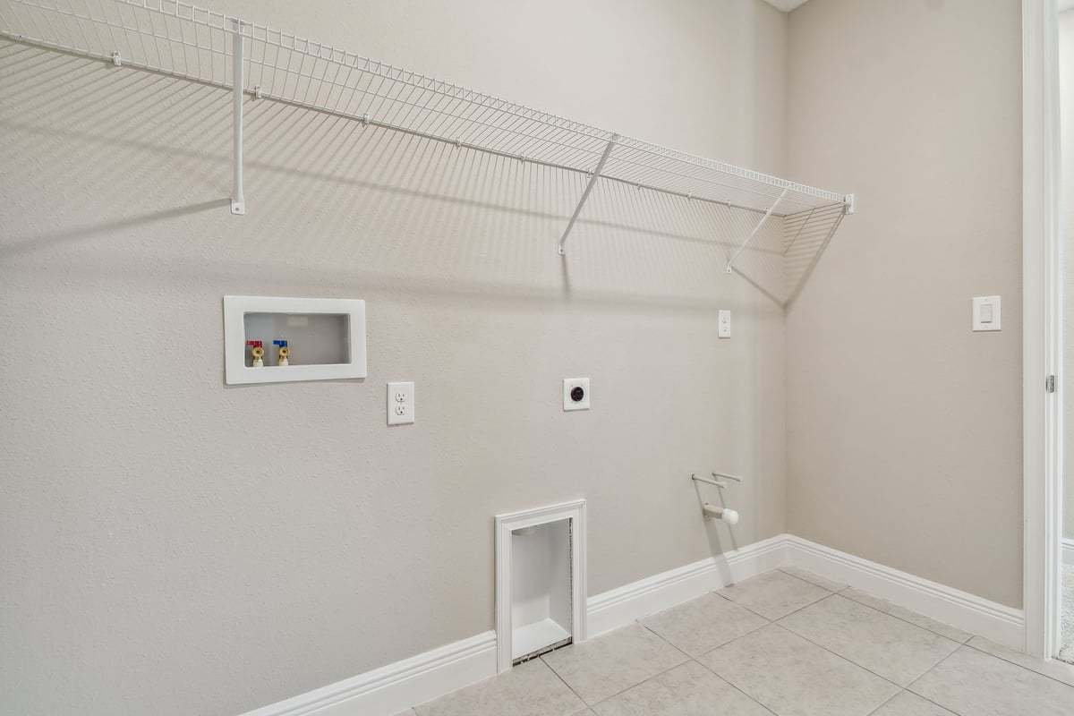 Sawgrass new construction home plan second floor laundry room by William Ryan Homes