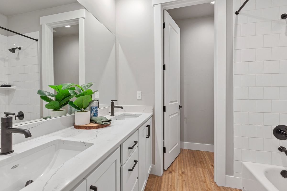 Bright and elegant primary bath in new homes for sale by top home builder