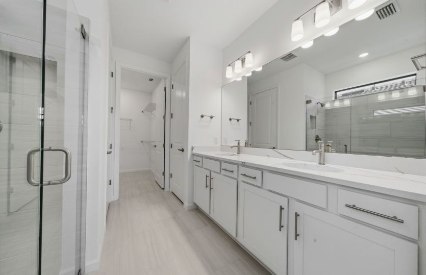 Owner's bathroom with dual-sink vanity