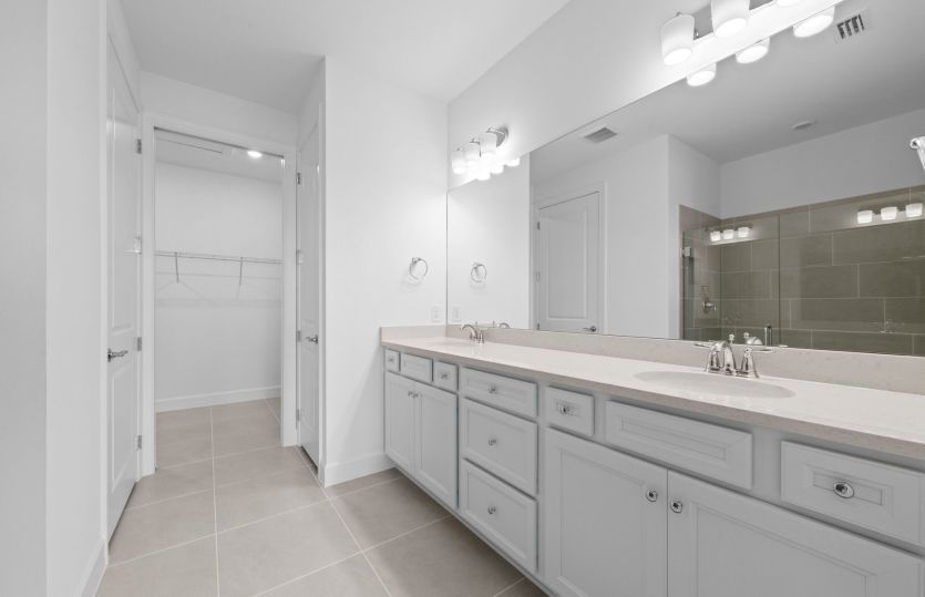 Owners bathroom with dual sinks
