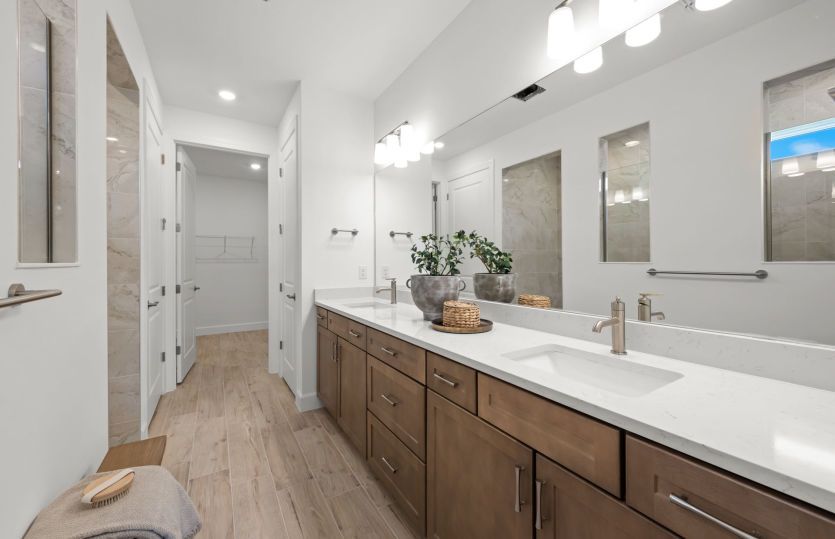 Owner's bathroom with dual sink vanity