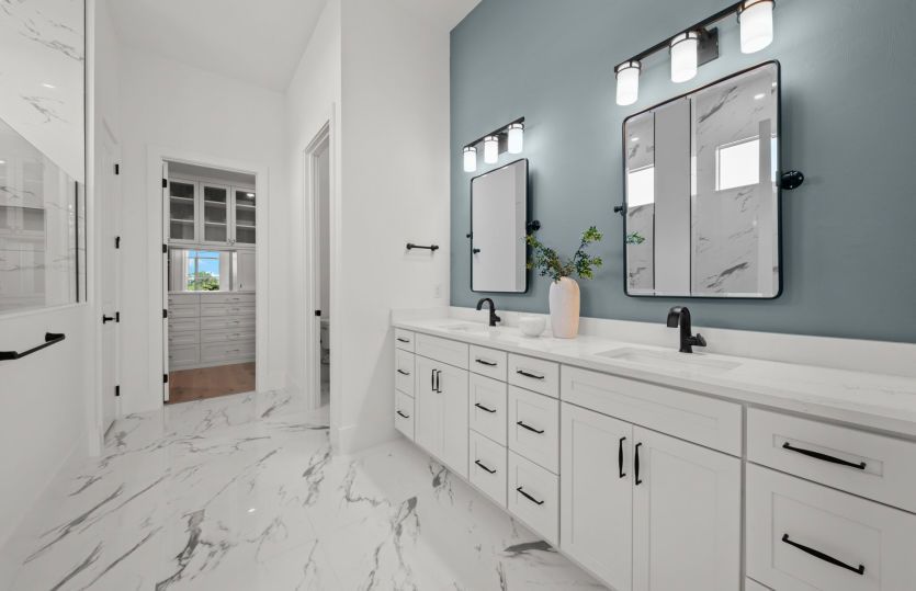 Owner's bathroom with dual-sink vanity