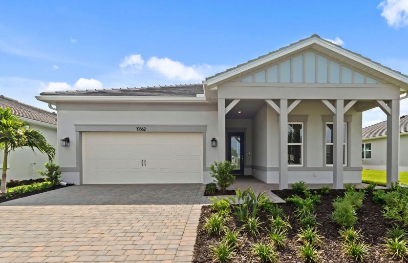 Welcoming Prestige Exterior of this home with Impact Glass