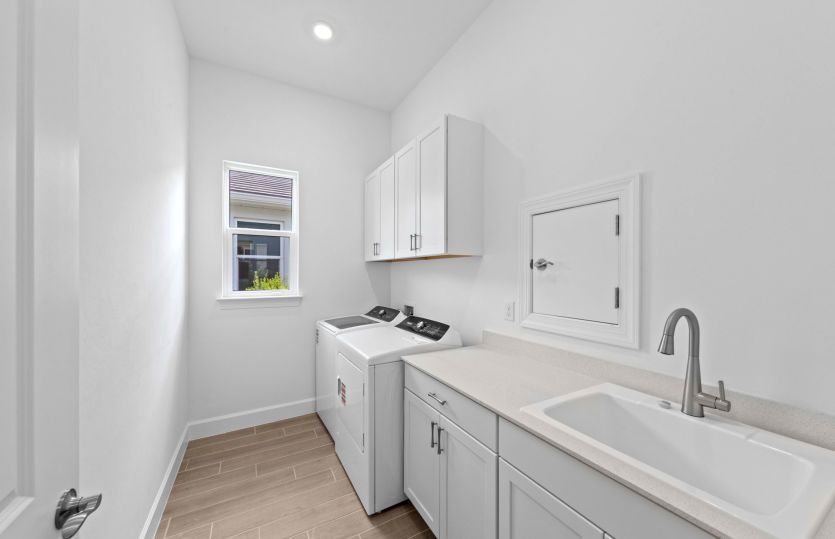 Laundry room with storage