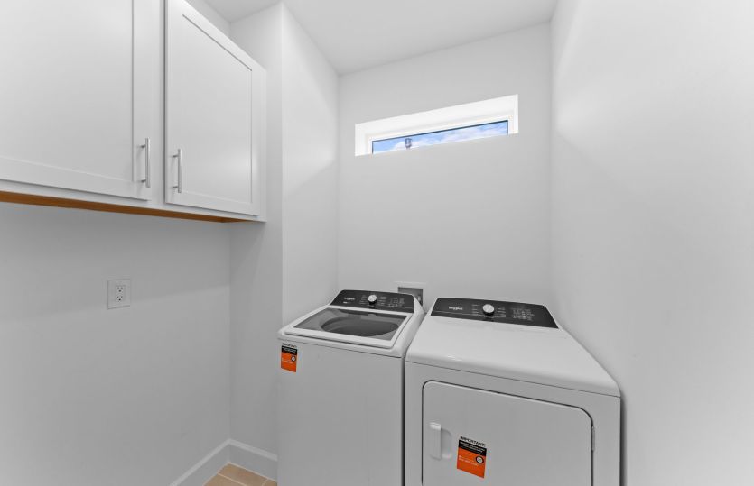 Laundry room with cabinets