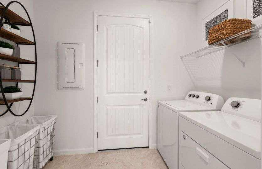 Spacious utility room with washer and dryer