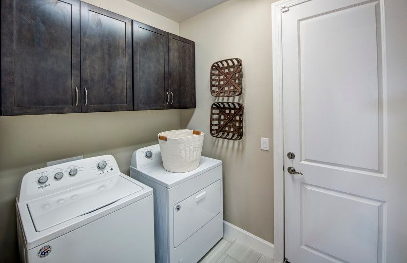 Utility room with washer/dryer and room for additional storage