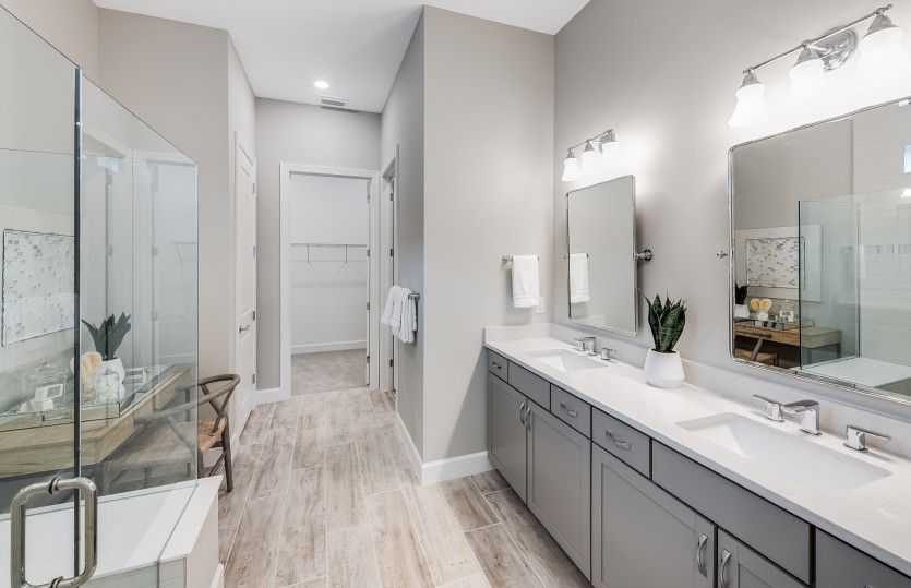 Luxurious owner's bathroom with dual sink vanity